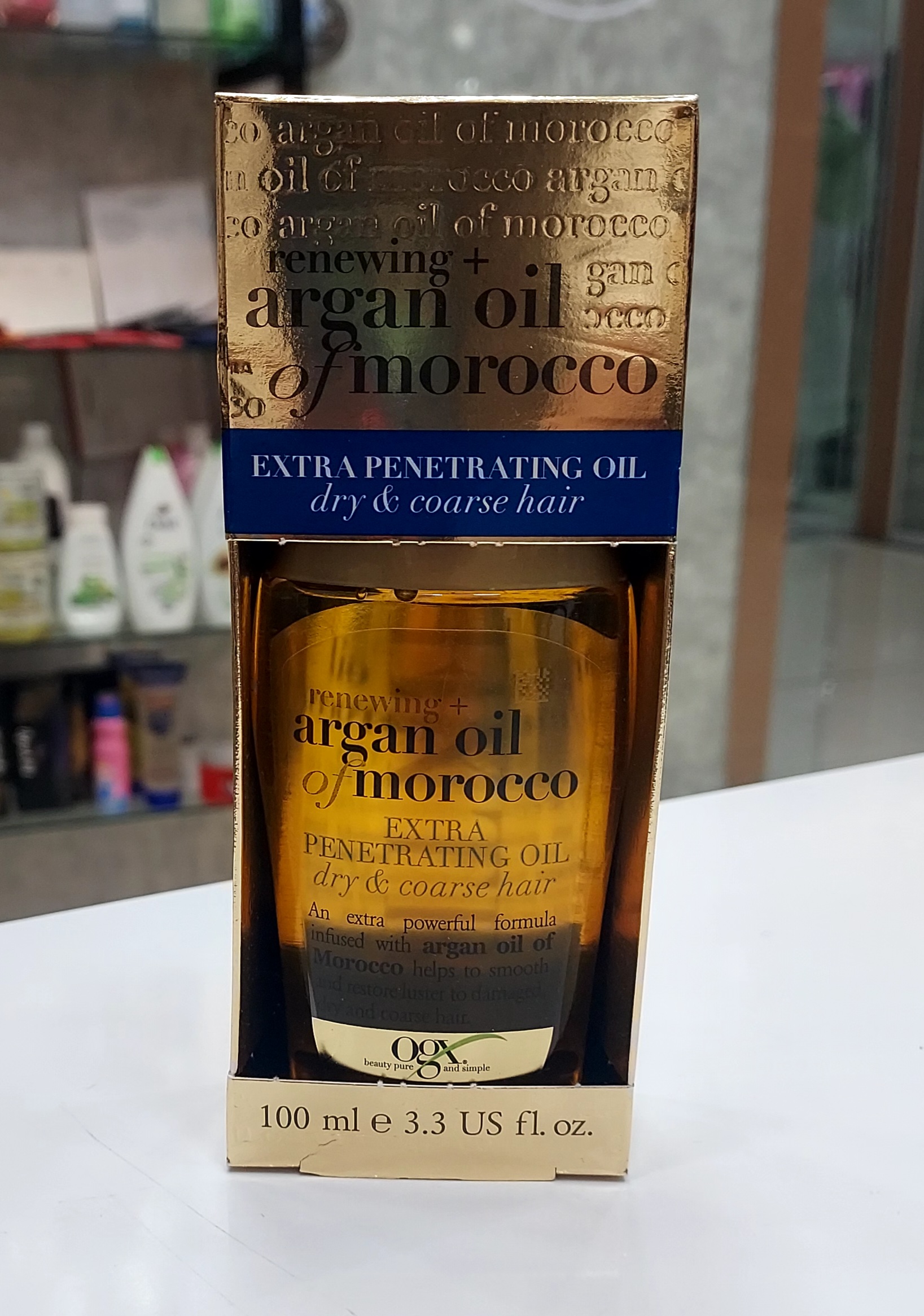 روغن آرگان مو OGX Renewing + Argan Oil of Morocco حجم 100 میلی‌لیتر